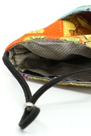 Detail of the two integrated pockets and the integrated shielding fabric