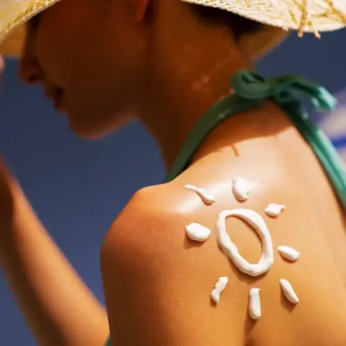 Sunscreen lotion on shoulders